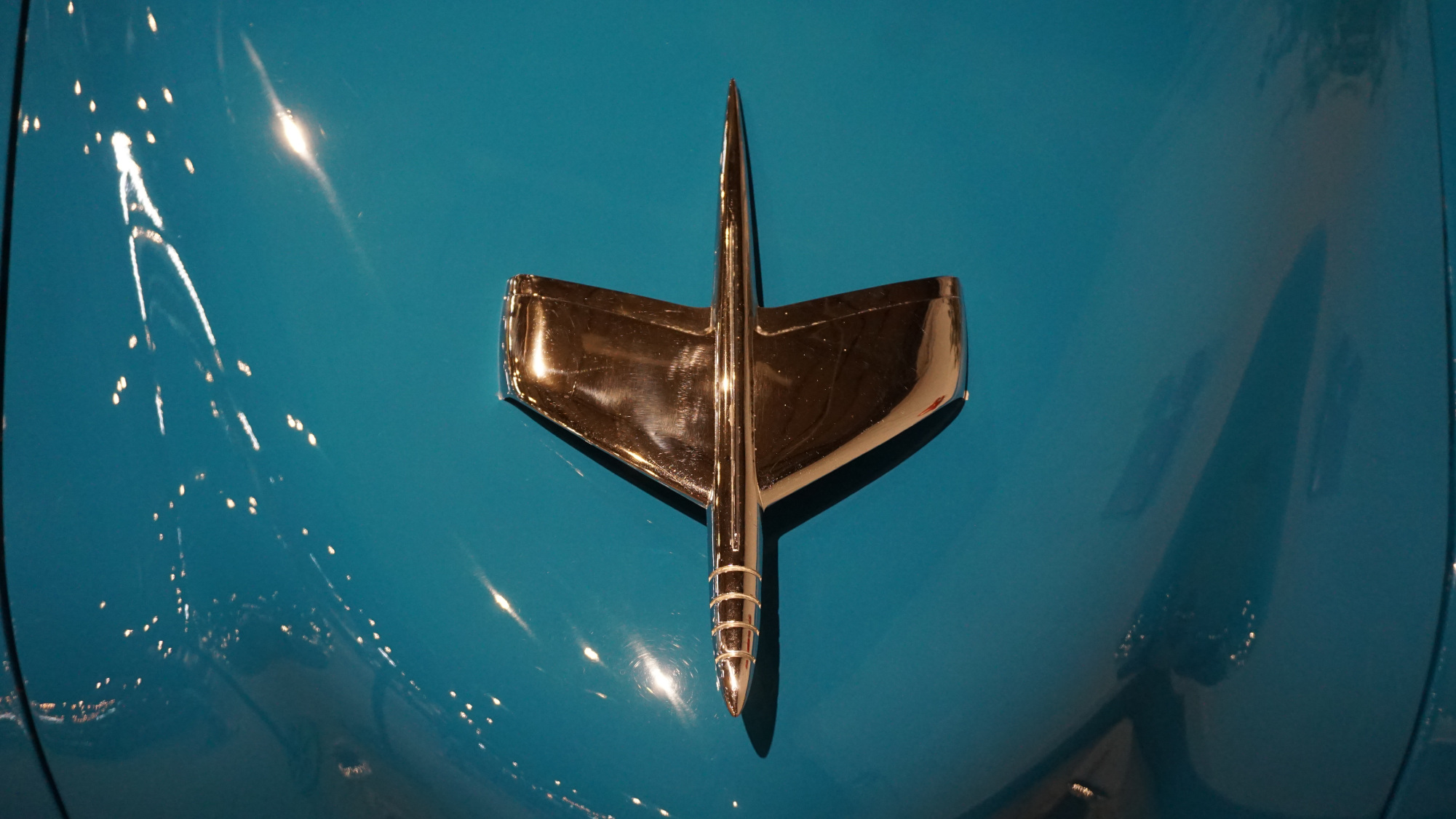 top-down view of airplane hood ornament